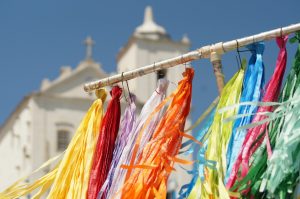 a bunch of tassels hanging from a clothes line
